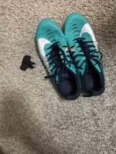 turquoise, black and purple nike track spikes, come with bag and extra spikes