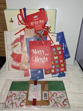 pack of 10 holiday gift bags with 10 sheet tissue small to large various sizes