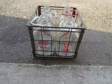 Vintage Metal Milk Crate with 4 One Gallon Glass Milk Jugs
