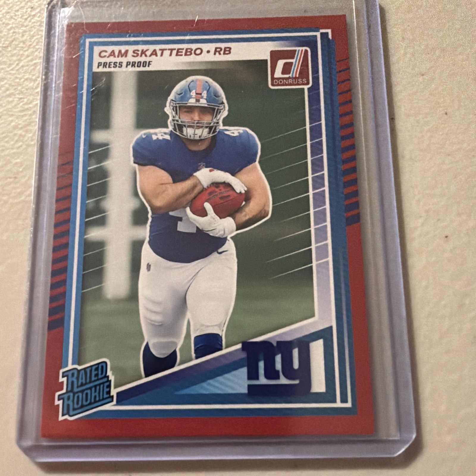 2025 Panini Donruss - Rated Rookie Cam Skattebo #302 Press Proof Red (RC)