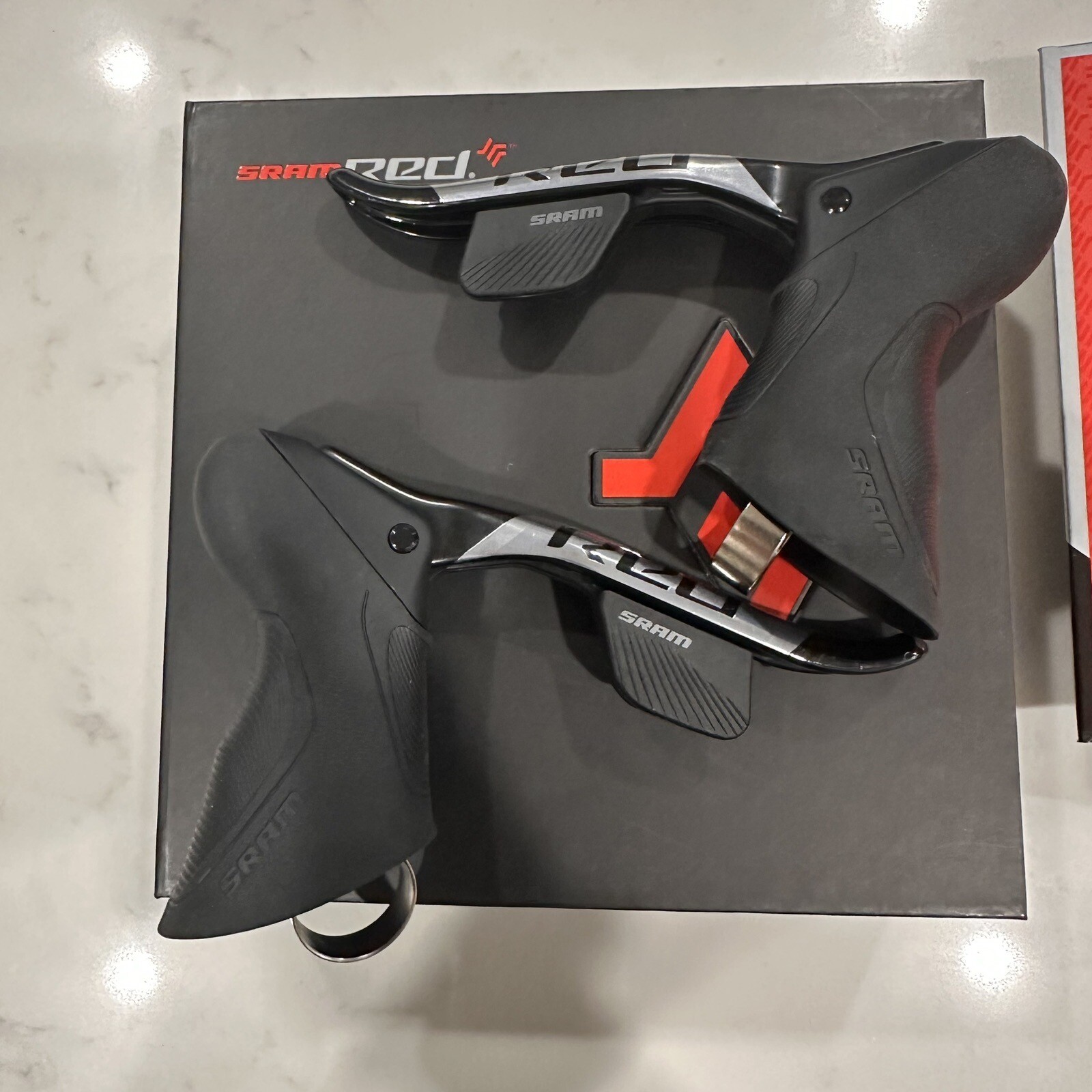 Sram Red eTAP AXS 12 speed rim brake pair of shifters. Right and Left