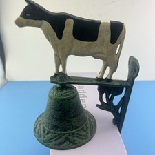 VINTAGE CAST IRON WALL MOUNTED DINNER BELL FARM HOUSE DECOR WITH A COW DESIGN