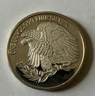 silver round (1 oz) depicting Korea/soldier (slightly tarnished)