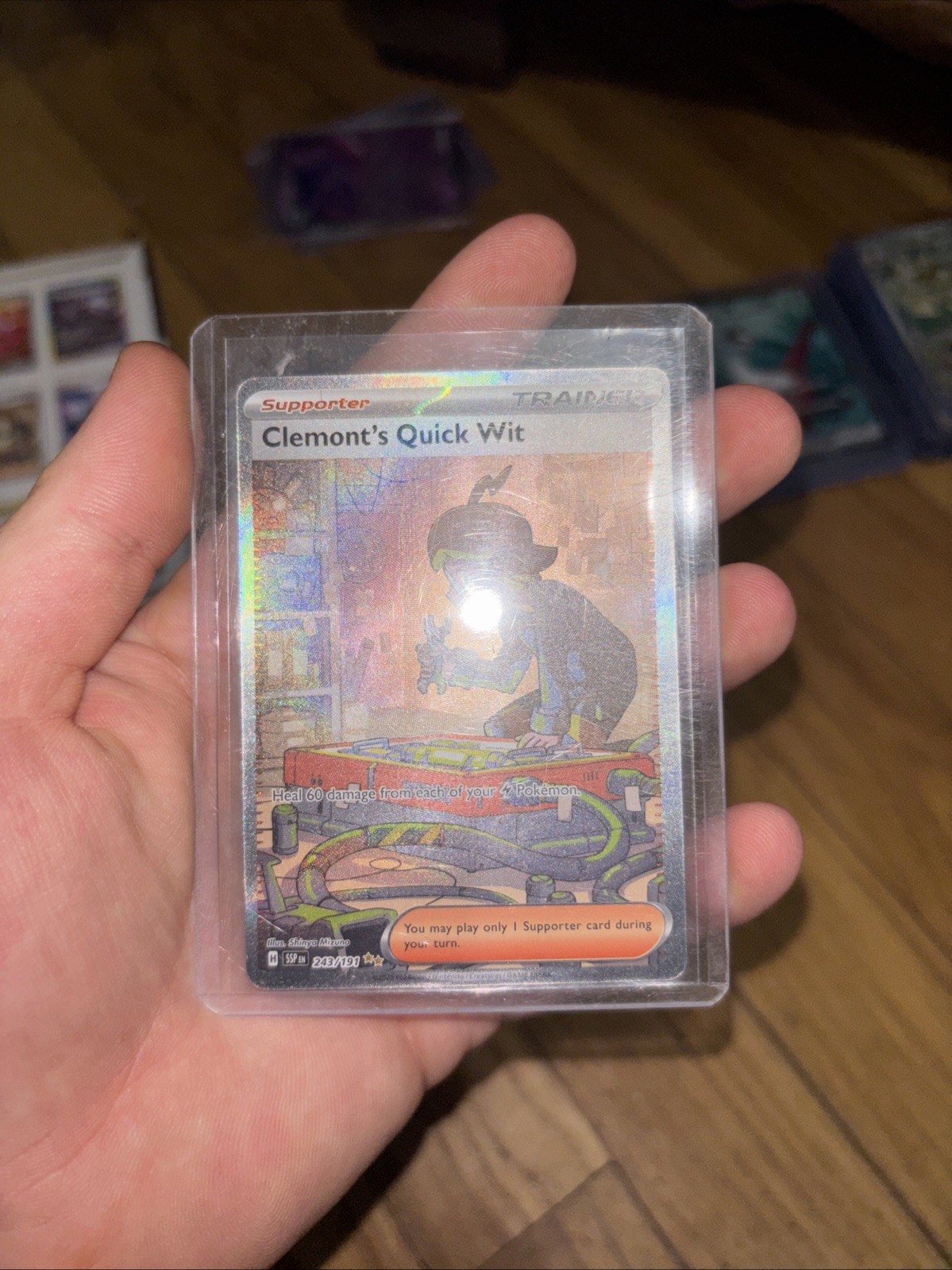 Clemont's Quick Wit 243/191 Sv08: Surging Sparks Holo