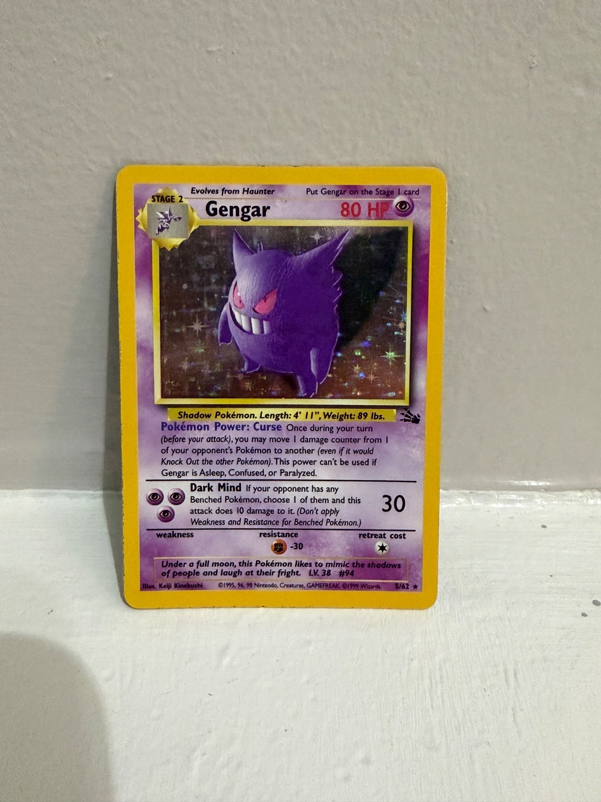 gengar holographic pokemon card value (Prime) [Holo, Graded PSA 7] RarityHolo Rare Hit Points130 HP Darkness Gengar 1999 Fossil #05/62 Unlimited