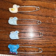 Vintage Diaper Pins With Cute Little Animal Heads On Them