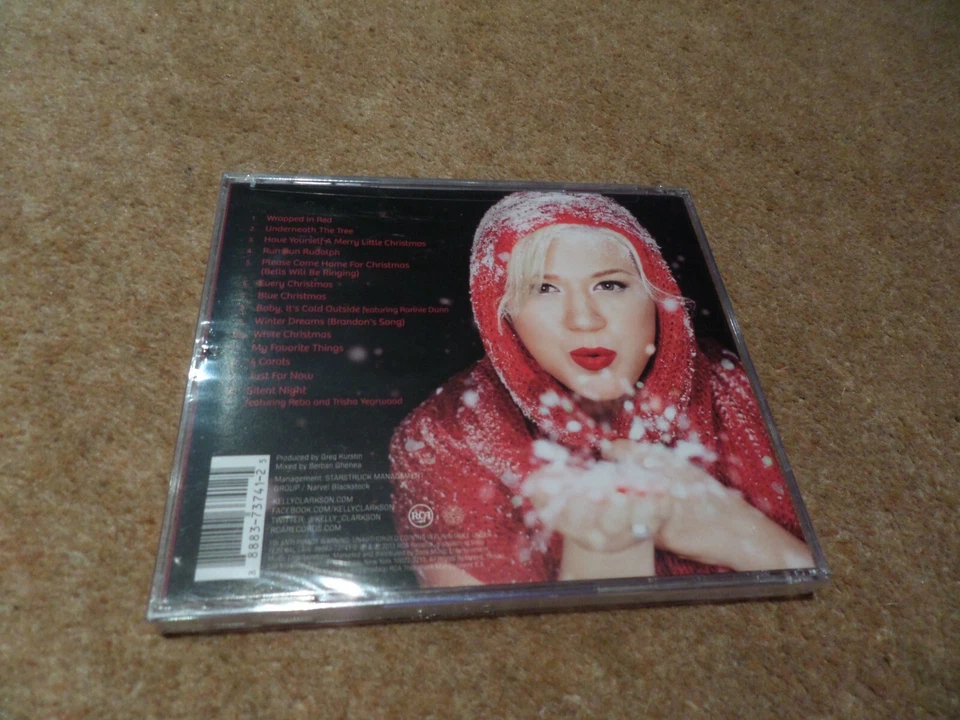 CD ALBUM NEW & SEALED KELLY CLARKSON WRAPPED IN RED - Image 2 of 2