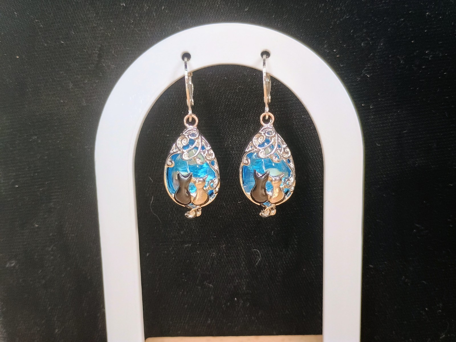 Silver-Toned Teardrop Black & White Cat Pendant with Blue Earrings