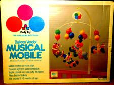 Dolly Toy Vtg Balloon Vendor Revolving Musical Mobile 625 Crib or Wall Mount