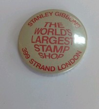 Vintage Stanley Gibbons Badge.  5.5cm Diameter In VGC