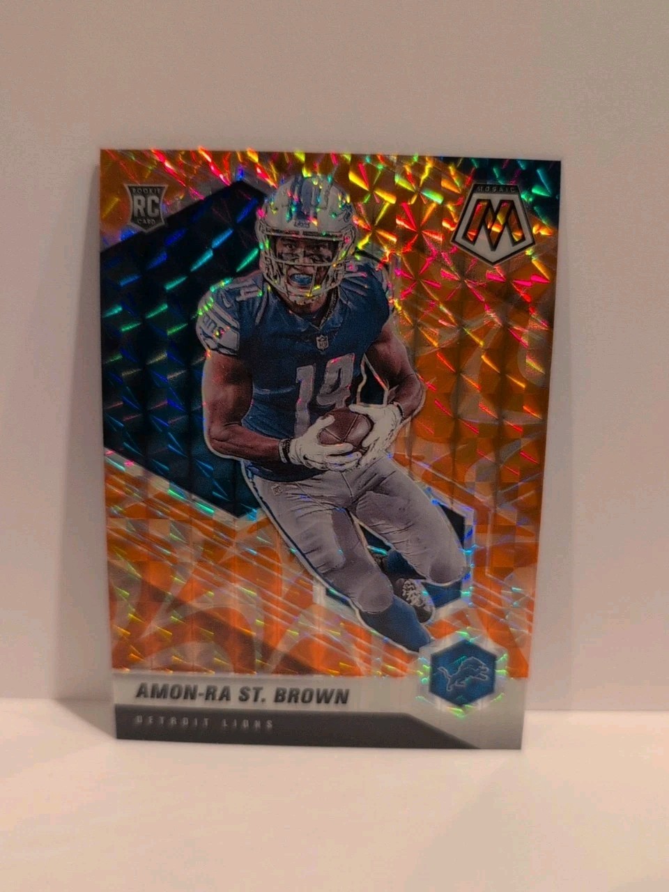 Amon-Ra St. Brown 2021 Panini Mosaic 328 Reactive Orange Prizm Rookie RC