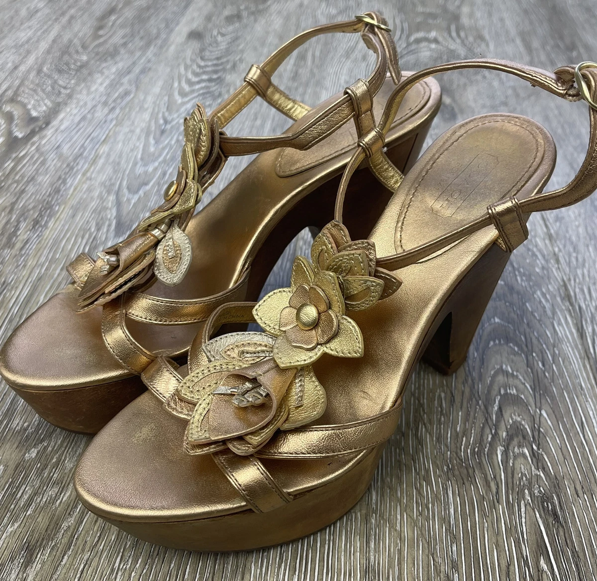Coach gold heels sale
