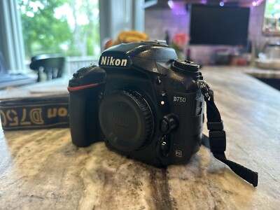 Nikon D750 camera body with Nikon MD-B16 battery pack (No