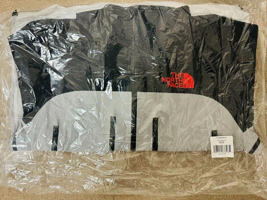 Veste homme Supreme TNF collé couture coquillage avec capuche noir gris taille M jamais utilisée neuve