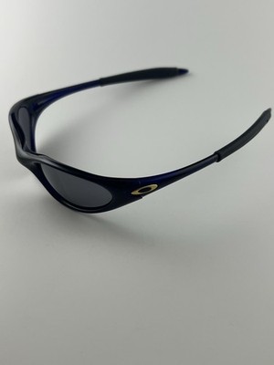 Oakley Minute 1.0 Crystal Blue Frame Black Iridium Lens Gold Icons XX RARE