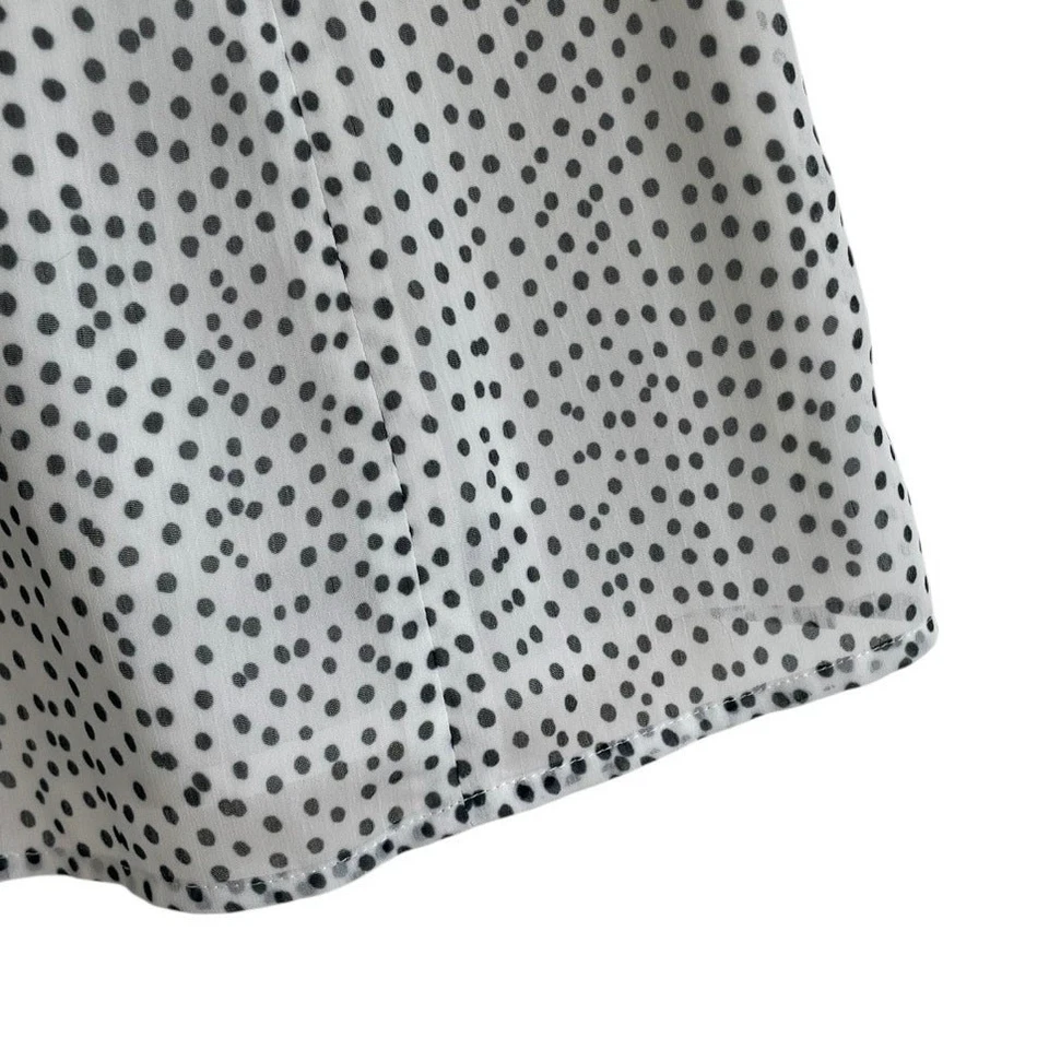 Blusa sin mangas Doncaster blanca y negra a lunares transparente con cuello en V Foto 4 de 4