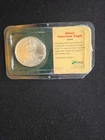 2004 SILVER AMERICAN EAGLE  1 OZ  FINE SILVER LITTLETON HOLDER. Uncirculated