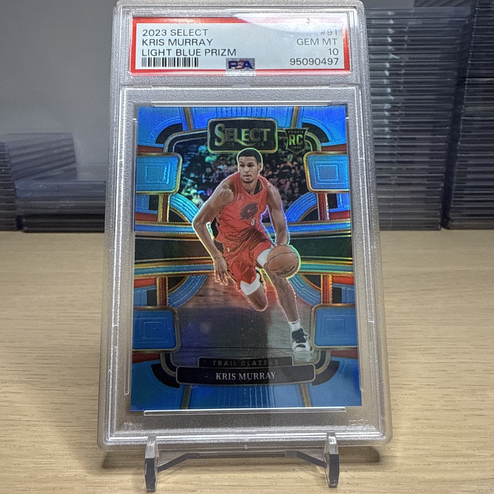 2023-24 Panini Select Concourse Light Blue Prizm #91 Kris Murray /299 RC PSA  10