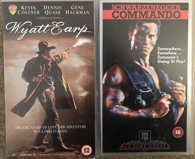 VHS videos/commando and wyatt Earp.