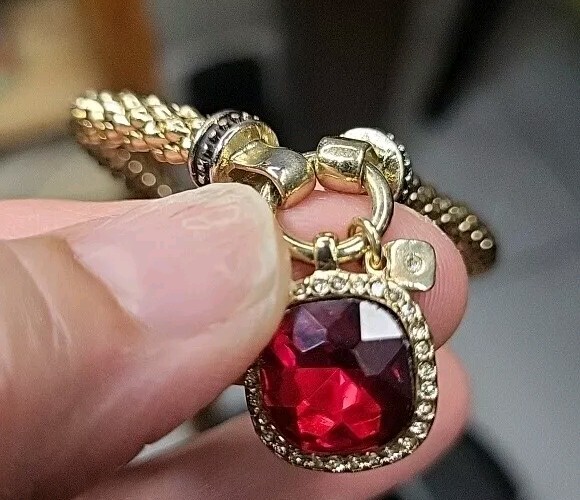 simulated ruby pendant On A Gold Tone Stretchy  B… - image 1