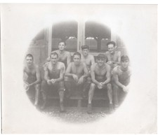 WW2 Photo of 8 Shirtless Soldiers Sitting on Porch Steps in Barracks