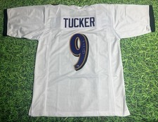 JUSTIN TUCKER  AUTOGRAPHED BALTIMORE RAVENS W JERSEY PIA