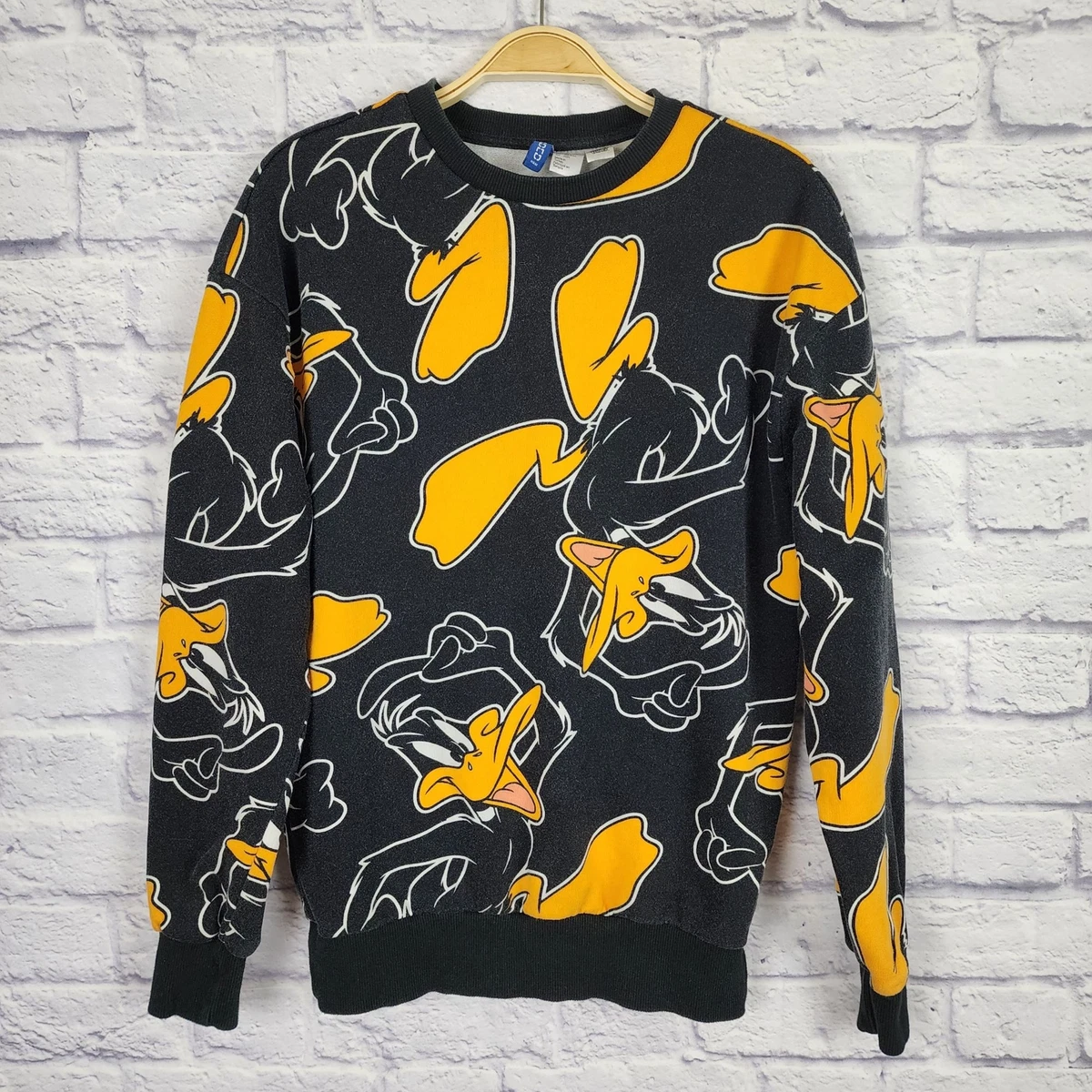 H M Looney Tunes Daffy Duck All Over Print Size XS Crewneck