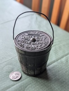 CAST IRON "WHITE CITY BUCKET STILL BANK