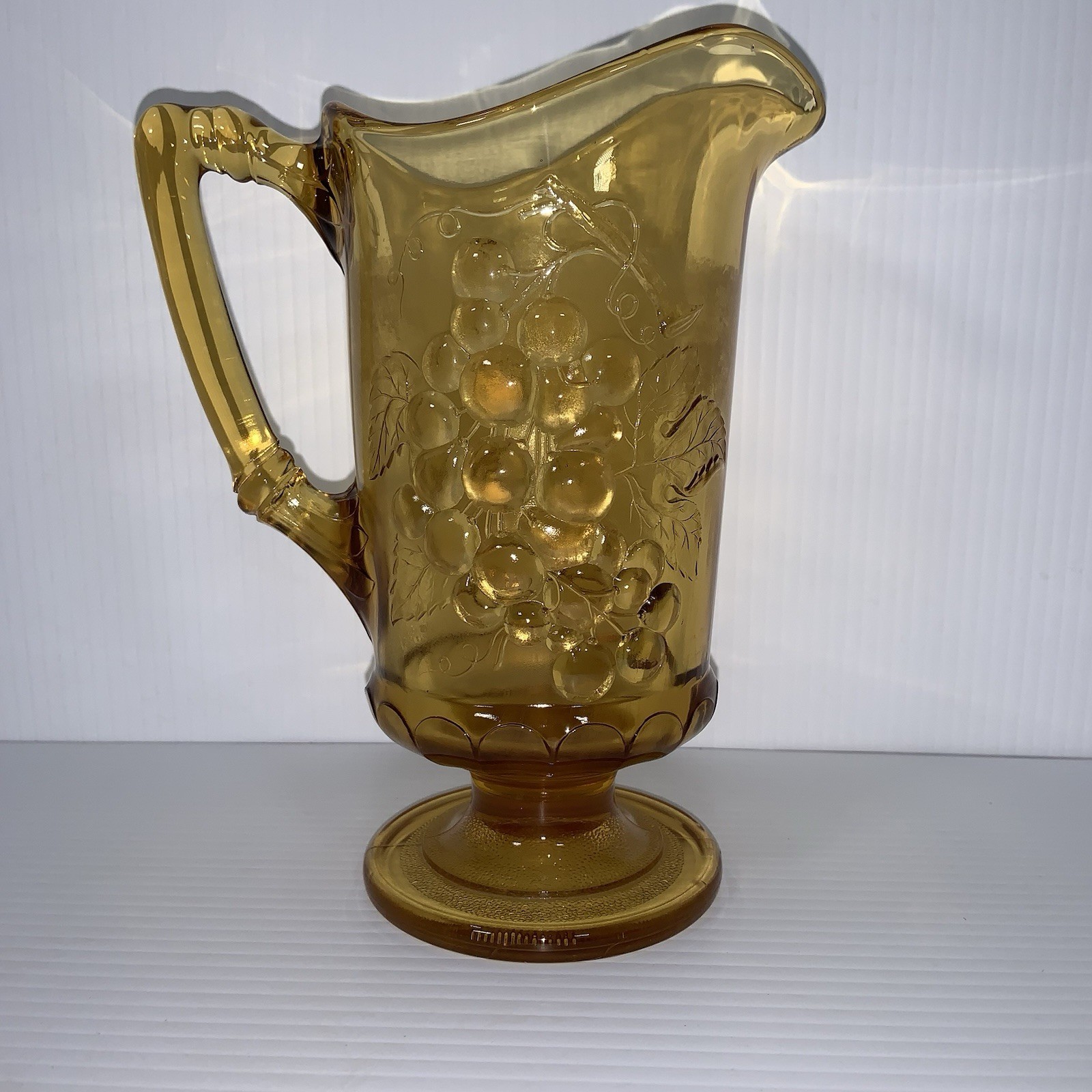 Imperial Glass Amber 8.5" Pitcher Embossed Grapes W/ Handle  Footed 20 oz.