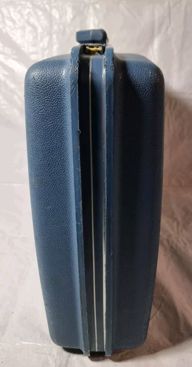 Elegante maleta samonita azul