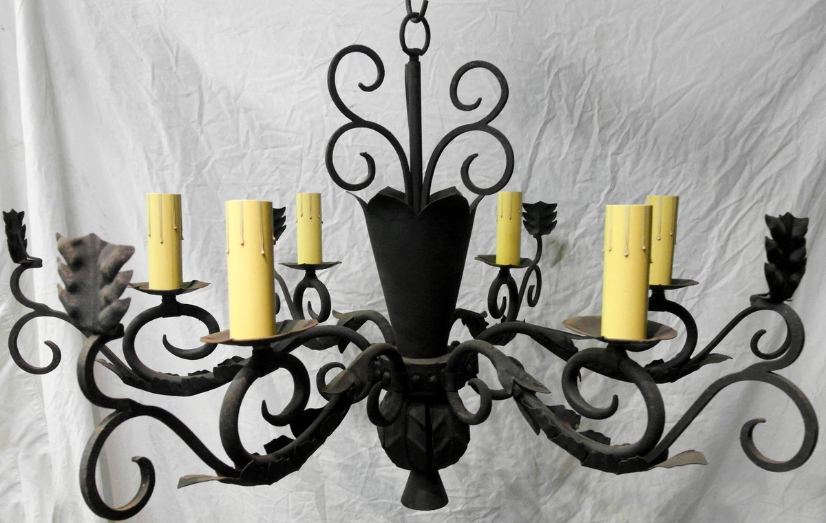 Antique wrought on sale iron candle chandelier