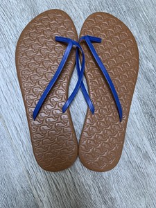 blue leather flip flops