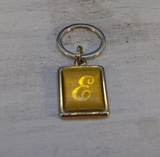 LETTER "E" GOLD COLORED KEYCHAIN