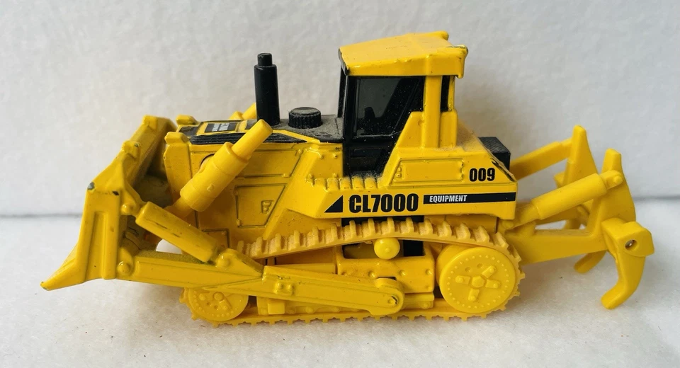 Bulldozer Matchbox Real Working Rigs CL7000 en amarillo (2008, RW009, 9 cm) - En muy buena condición Foto 2 de 4