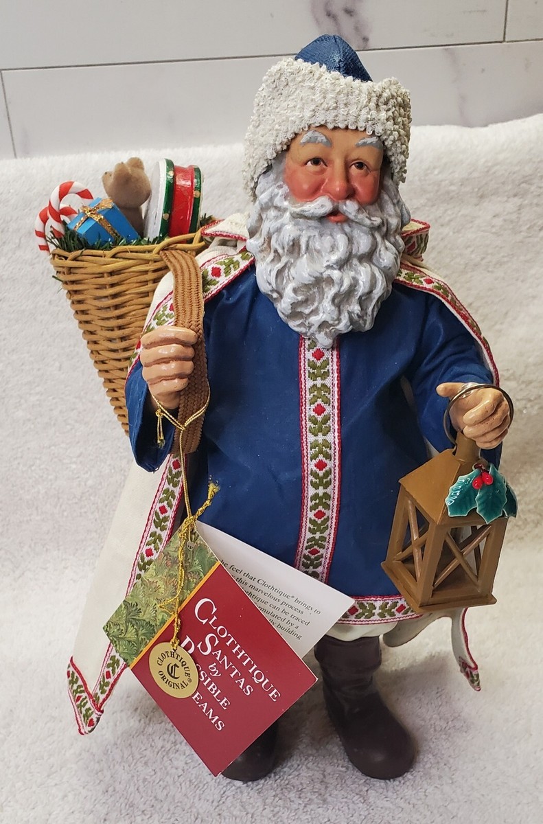 Clothtique Possible Dreams Santa on a winter's eve wearing cape