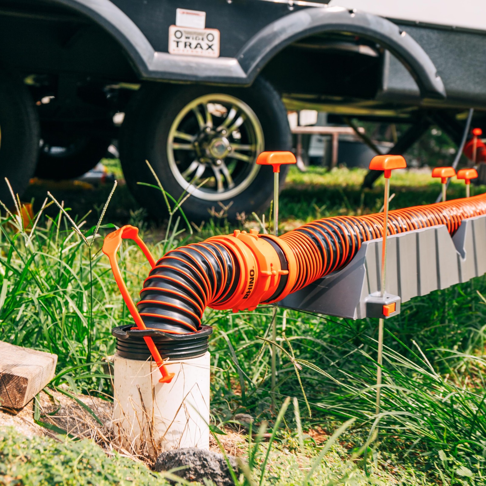 Camco Flexible 3-in-1 RV Sewer Hose Adapter  Drain Seal - Easily Connect Your