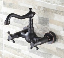 Oil Rubbed Bronze Wall Mounted Bathroom Faucet Swivel Spout Basin Mixer Tap