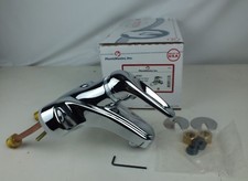 New Plumbmaster 33387 Eternity Loop Handle Lav Faucet