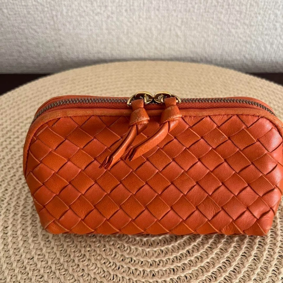 Bolsa Bottega Veneta Intrecciato en Hermes Naranja con Cremallera Dorada. Foto 3 de 4