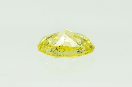 Diamante de corte ovalado elegante color amarillo suelto mejorado 1,20 quilates certificado IGI SI2 - Imagen 7 de 9