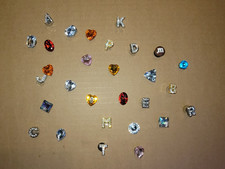 Any 4 from Lots of Letters  gems shoes charms for crocs and clogs.