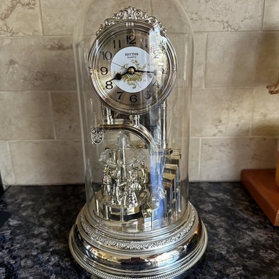 Rhythm Quartz Anniversary Clock Timepiece Known for Its Rotating Pendulum Works