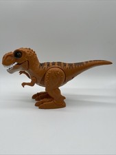 ZURU Robo Alive T-Rex Robotic Pet with Dino Sounds and Glow Scars - Works