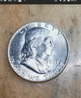 Offers Considered Uncirculated 90% Silver is the1963 D Franklin Half Dollar