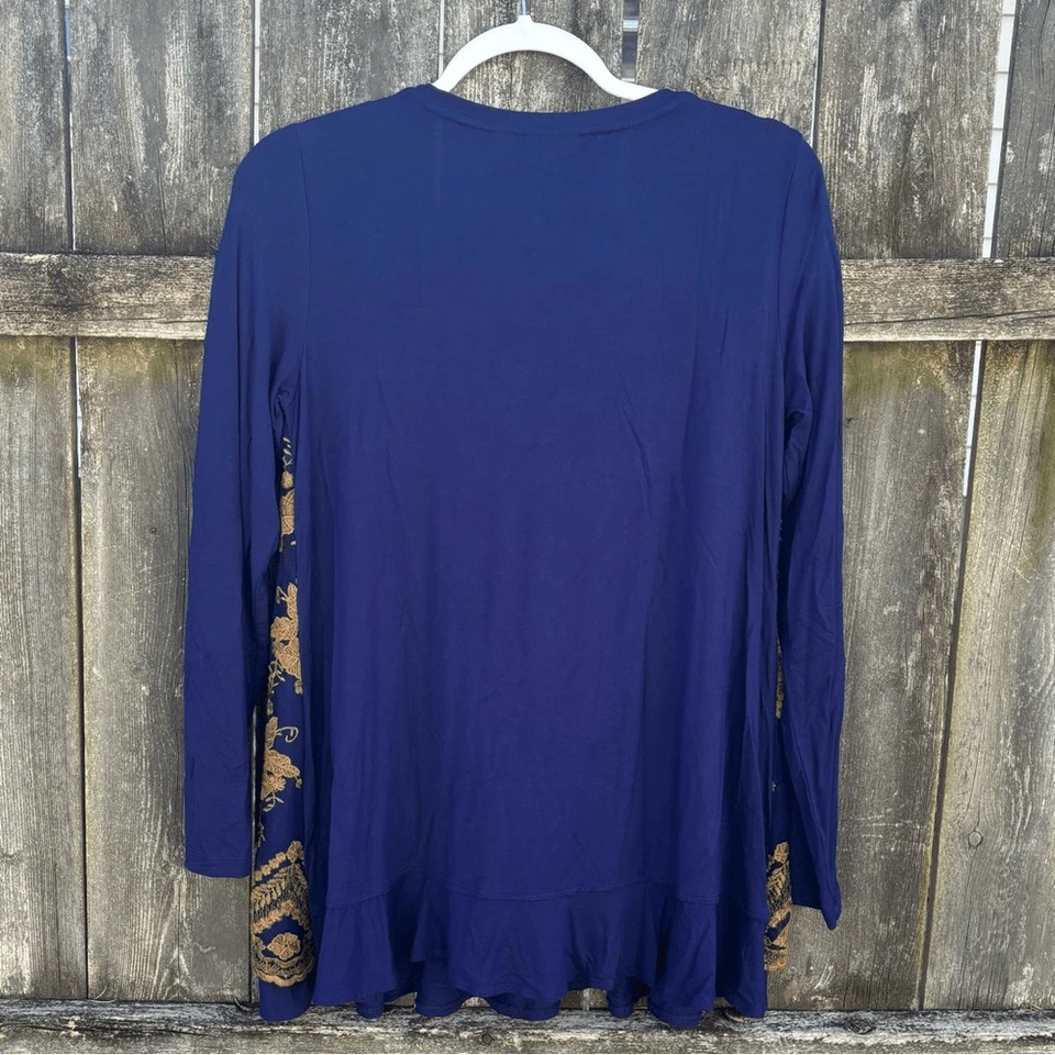 Top túnica de encaje floral dorado lujoso con logotipo XS Foto 4 de 4