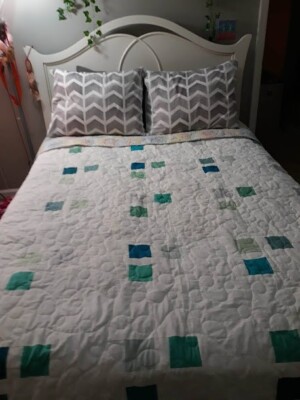 Modern white and green color quilt