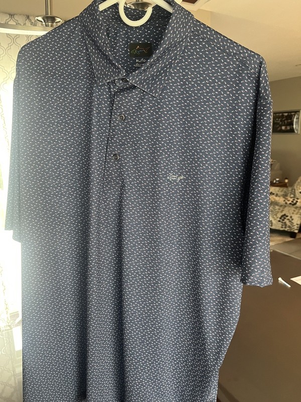 NEW Greg Norman ML75 Men's L Polo Golf Shirt Navy Blue Moisture Wicking Printed