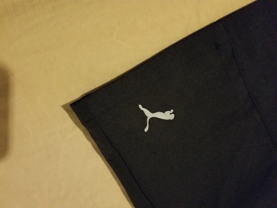 Falda PUMA S pequeña negra elástica de golf para mujer Foto 2 de 4