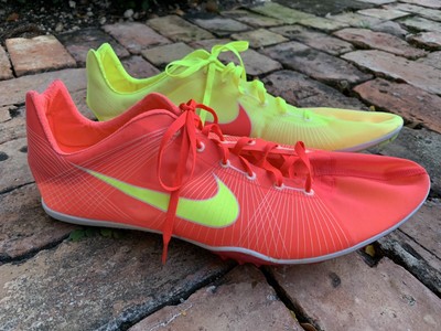 red nike track shoes