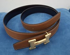 Cintura hermès beige e nera con fibbia dorata spazzolata, 110cm x 32mm